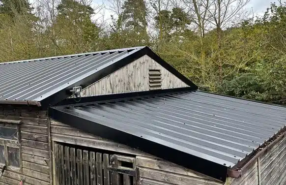 barn that has a new steel roof