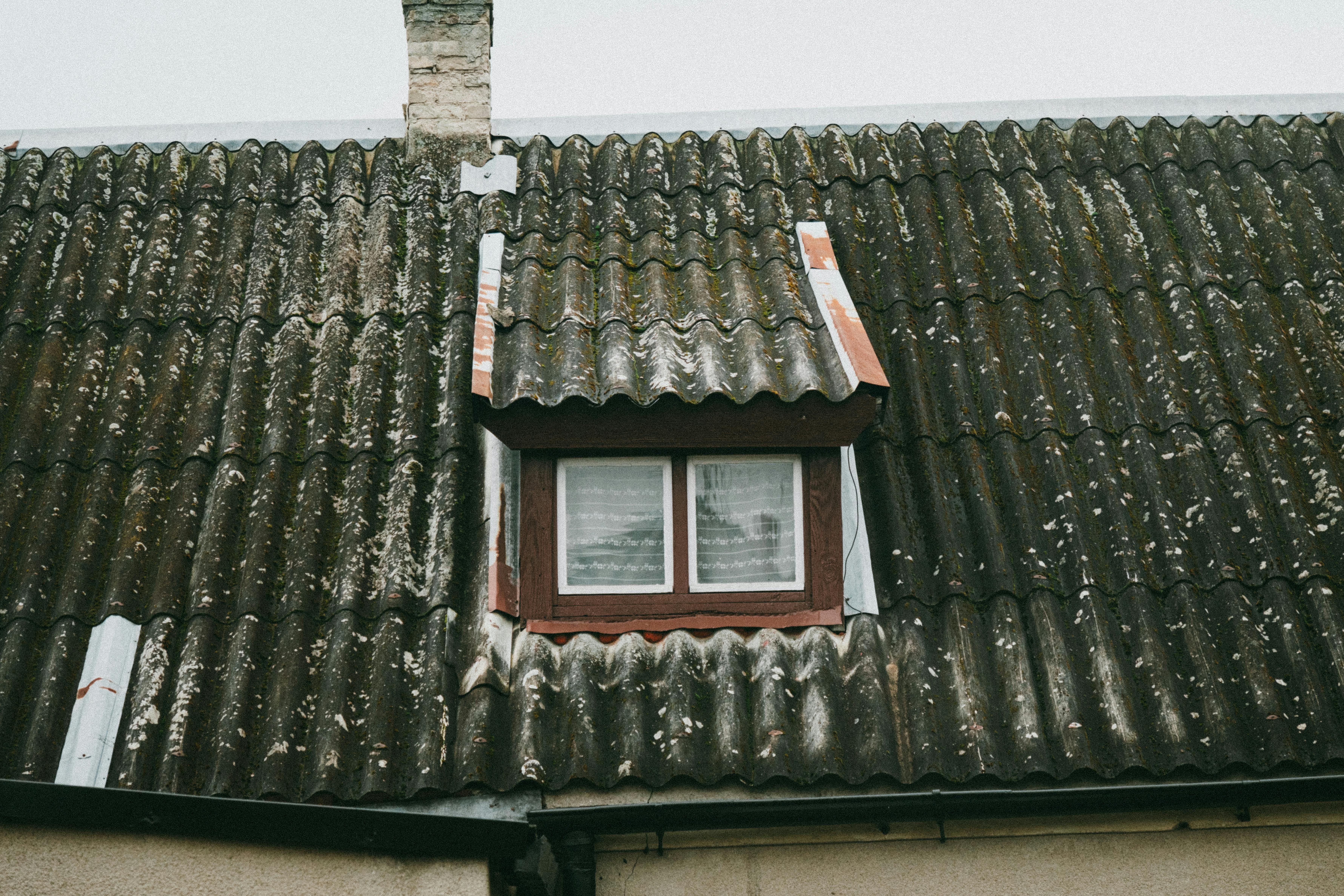 Asbestos roofing tiles on a house