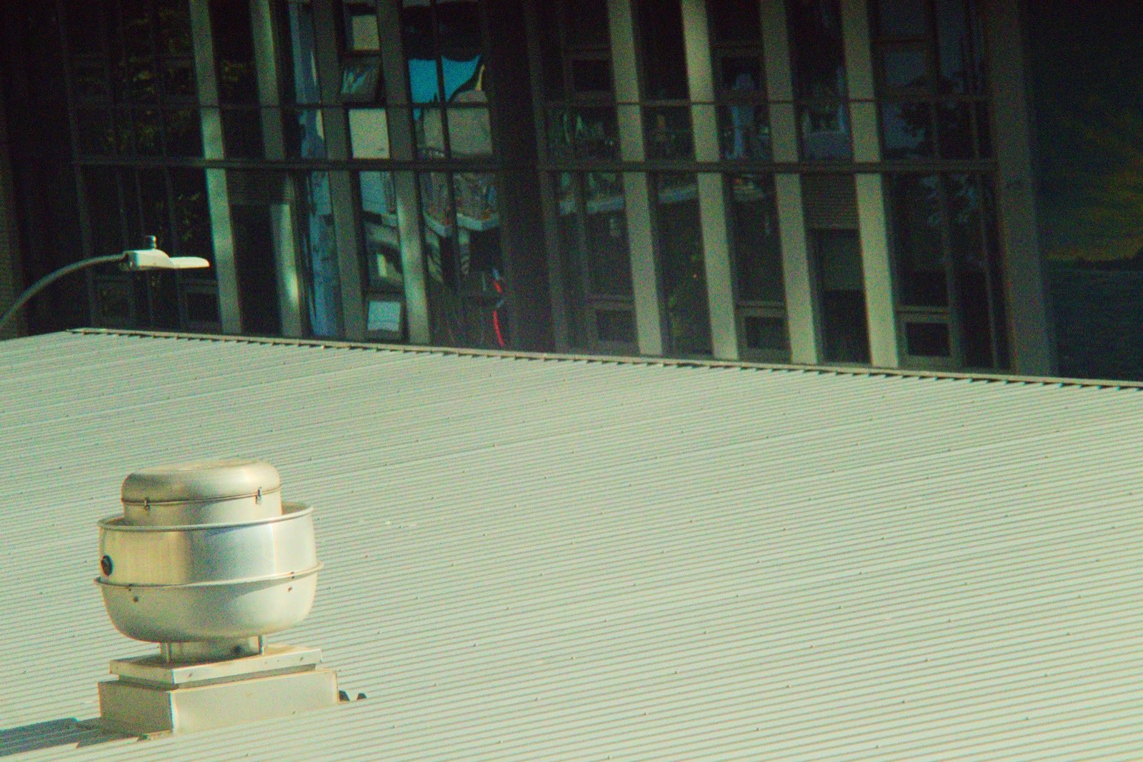 metallic vent on a corrugated roof